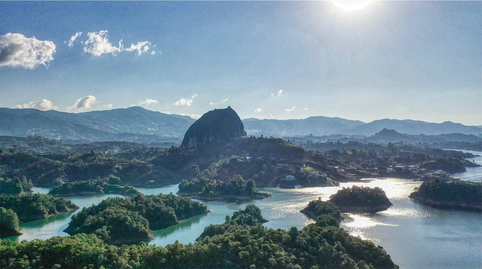 Islands of the Guatapé reservoir seen from the Islitas viewpoint, with La Piedra del Peñol in the distance