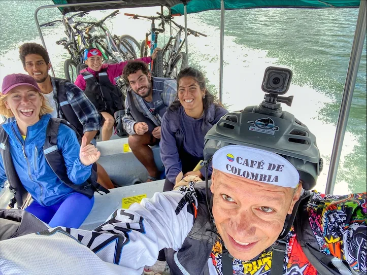MTB group crossing the Guatapé reservoir by boat